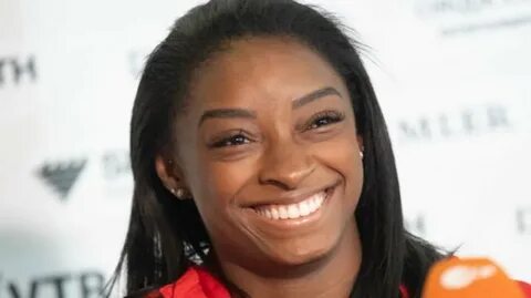 Simone biles piercings