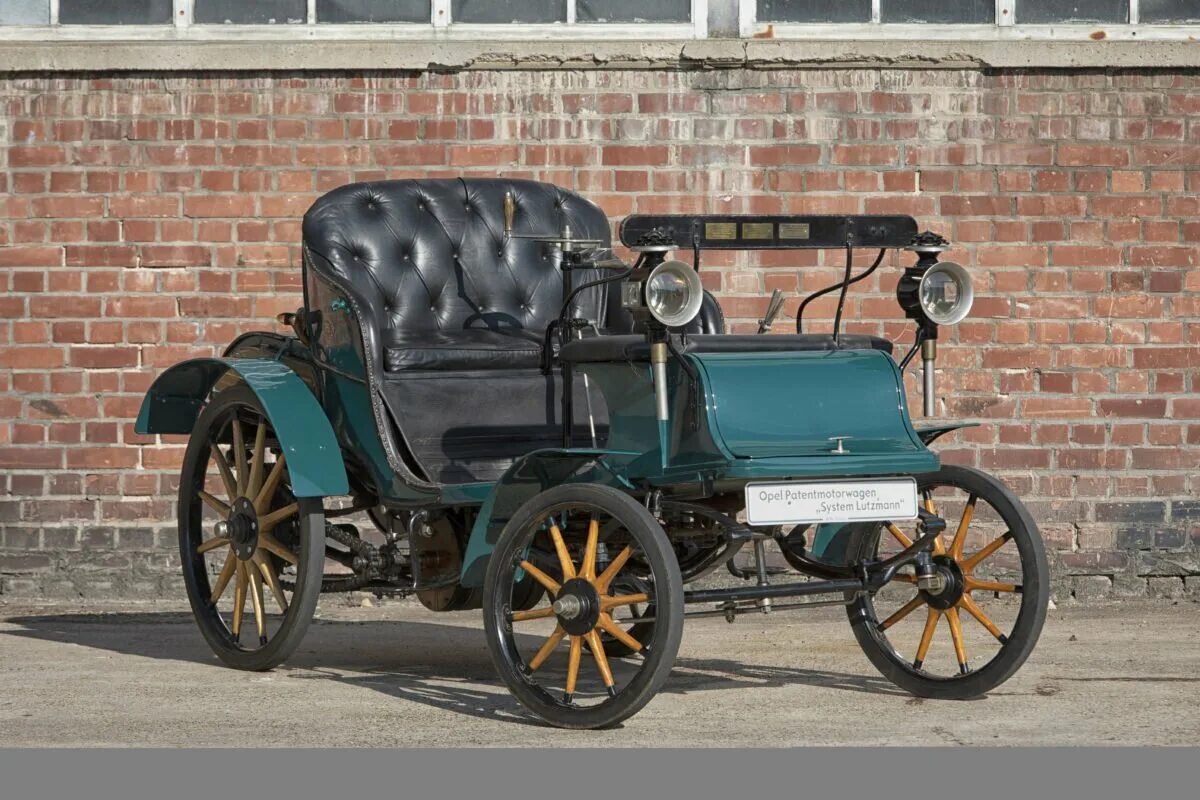 Акция первый автомобиль. Opel Lutzmann 1899. Opel 1899 год первый автомобиль. Опель 1862. Лутцман-Опель 1900.