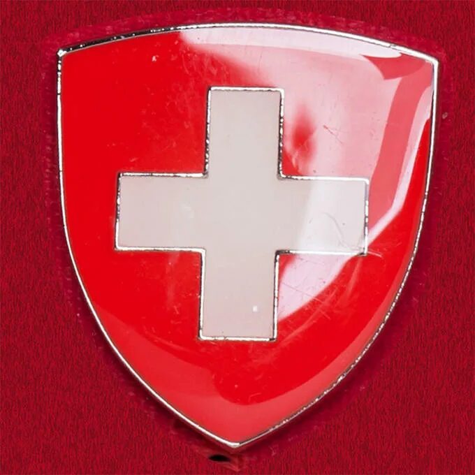 Швейцария флаг и герб. Геральдика Швейцарии. Швейцарский герб. Швейцарский щит. Герб с красным крестом