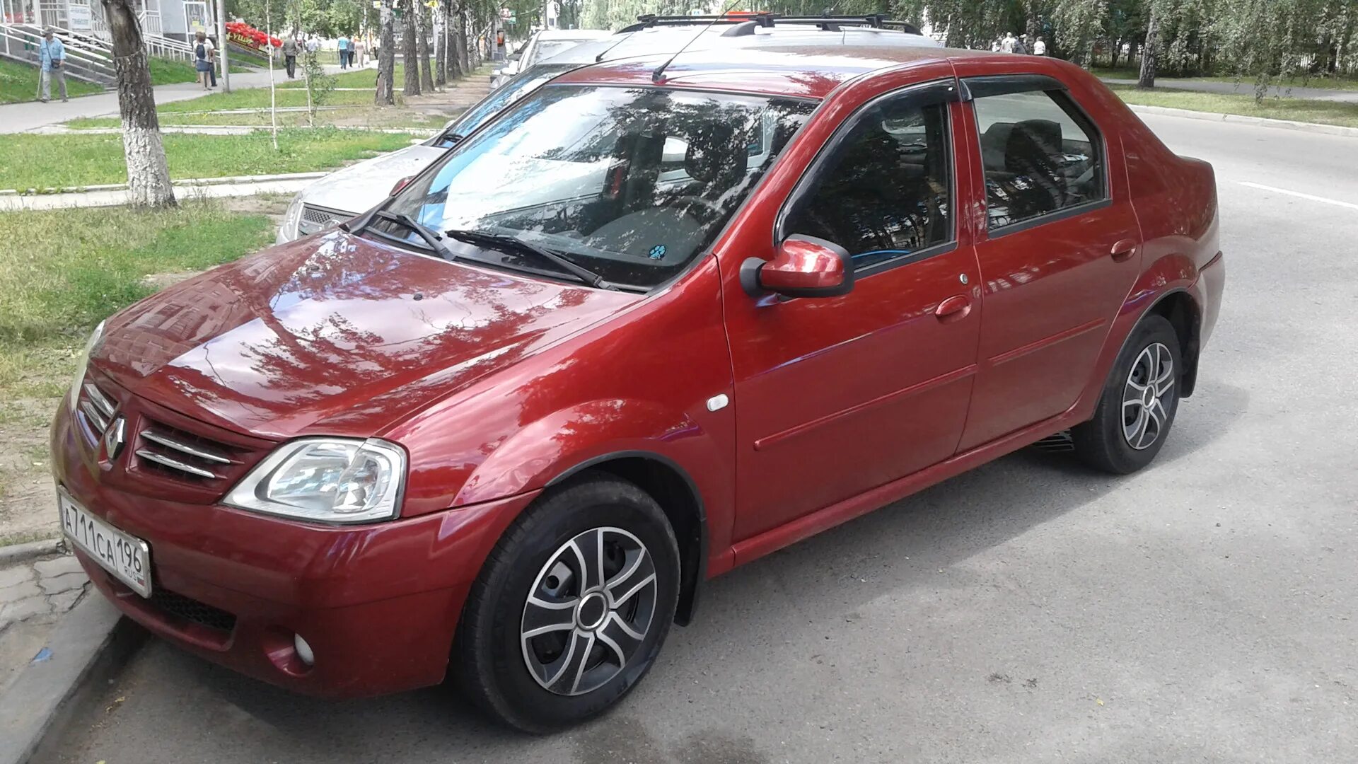 Запчасти логан 1. Красный логан 1. рено логан 1 красный. renault logan 1 красный. рено логан 2 на черных колпаках.
