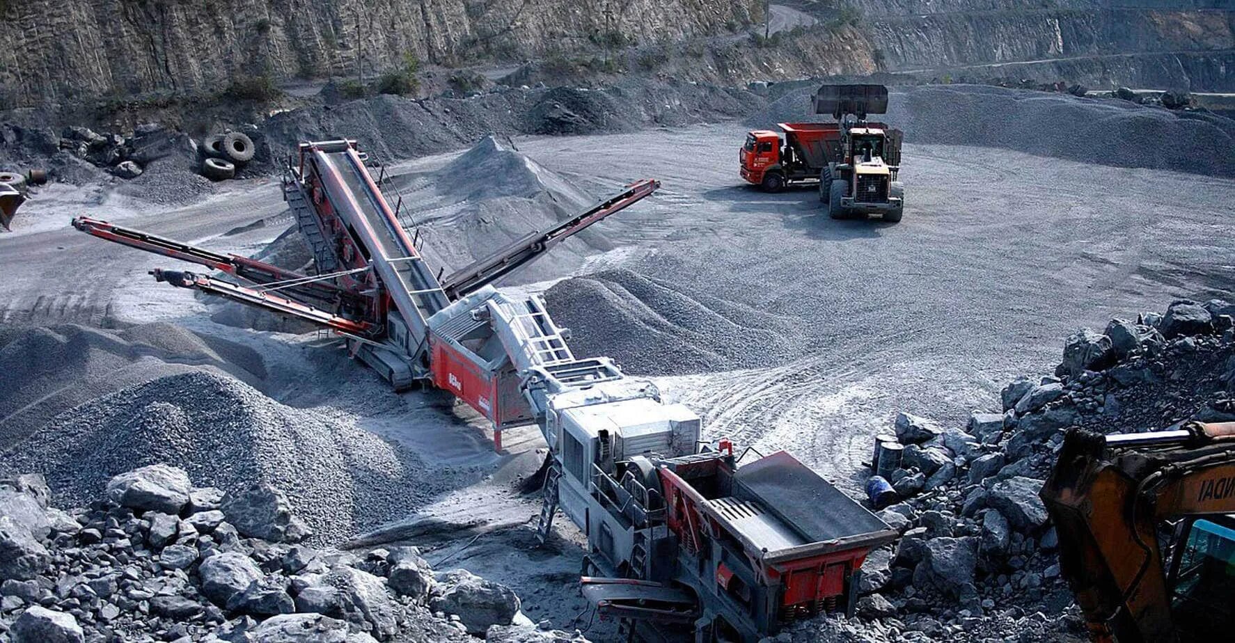 Карьер щебеночный гранитный карелия. Добыча щебня карьер. Карьер щебень. Карьеры по добыче щебня. Добыча гравия.