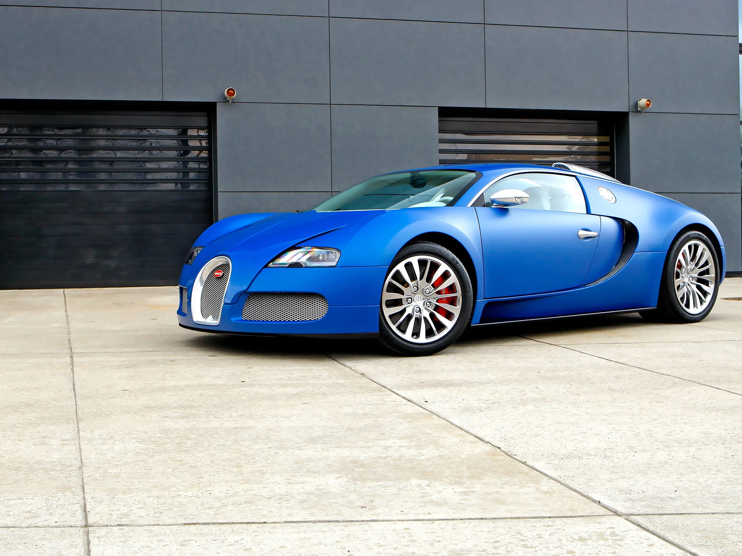 Bugatti производитель. Бугатти Вейрон 2009. Bugatti 2009 Veyron centenaire. Bugatti Veyron 16.4 колесо. Бугатти Бугатти Вейрон.