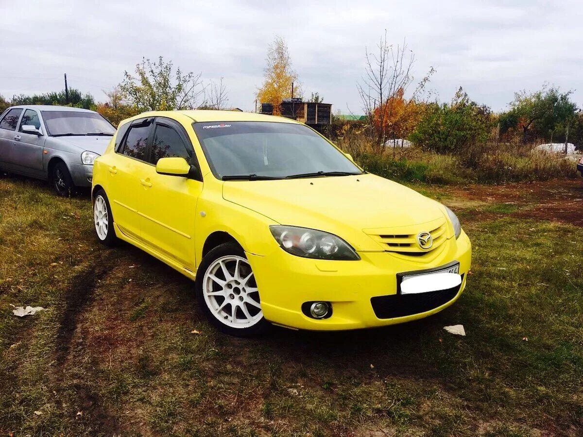 Мазда 3 желтая хэтчбек. Желтая Мазда 3 БК. Mazda 3 2.0 2005. Желтая Мазда 3 БК хэтчбек. Mazda желтая