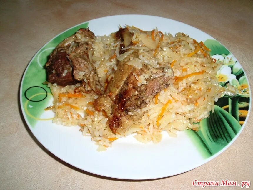 Рис с квашеной капустой и мясом. Тушеная капуста с рисом. Рис с капустой и мясом. Капуста с рисом и мясом тушеная.