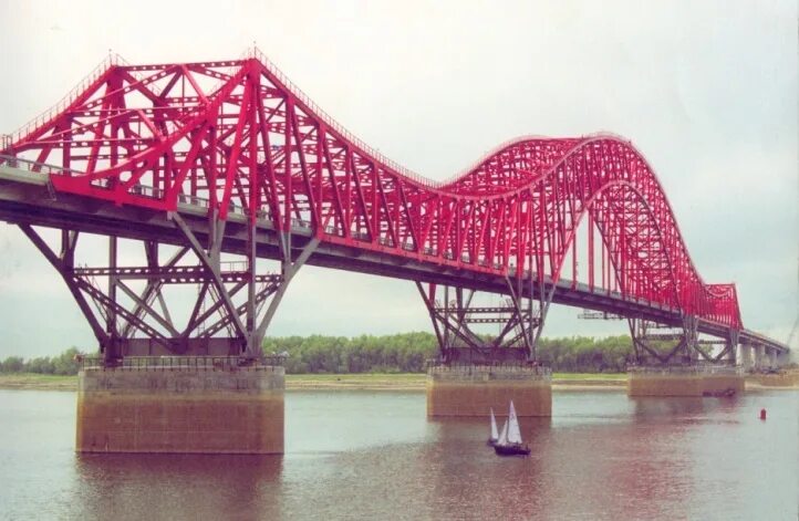 Сколько ушло металла на мост красный дракон. Мост через Иртыш в Ханты-Мансийске. Красный дракон Ханты-Мансийск. Мост дракон в Ханты-Мансийске. Ханты Мансийский мост красный дракон.