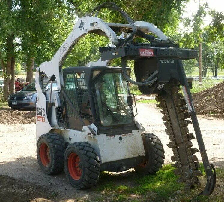 Bobcat навесное. Bobcat s175 ямобур. Ямобур д400 на базе Бобкэт. Мини погрузчик Bobcat 300 с гидромолотом. Гидробур для Bobcat s770.