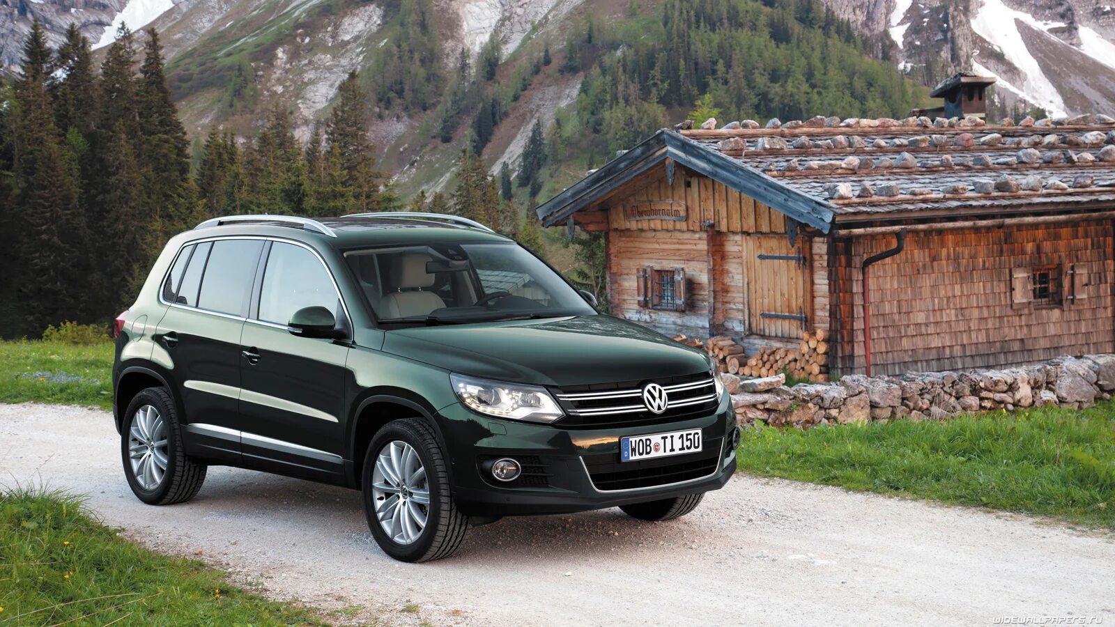 Машина volkswagen tiguan. Tiguan 1. Volkswagen Тигуан. VW Tiguan 1 поколение. Tiguan 1 поколение Рестайлинг.