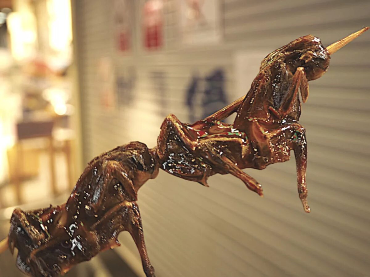 Странные деликатесы. Необычные блюда. Странные деликатесы. Необычные морепродукты. Осьминог блюдо.