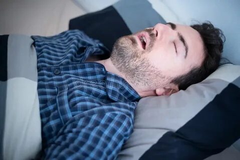 Зевает во сне причины