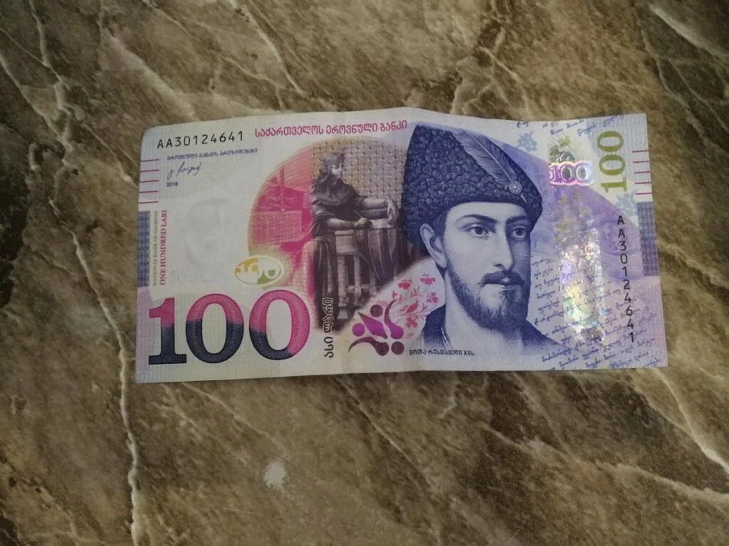 Экономика сингапура. Купюра 100 лари. Грузинские лари 2022. Лари валюта. 200 лари грузия.