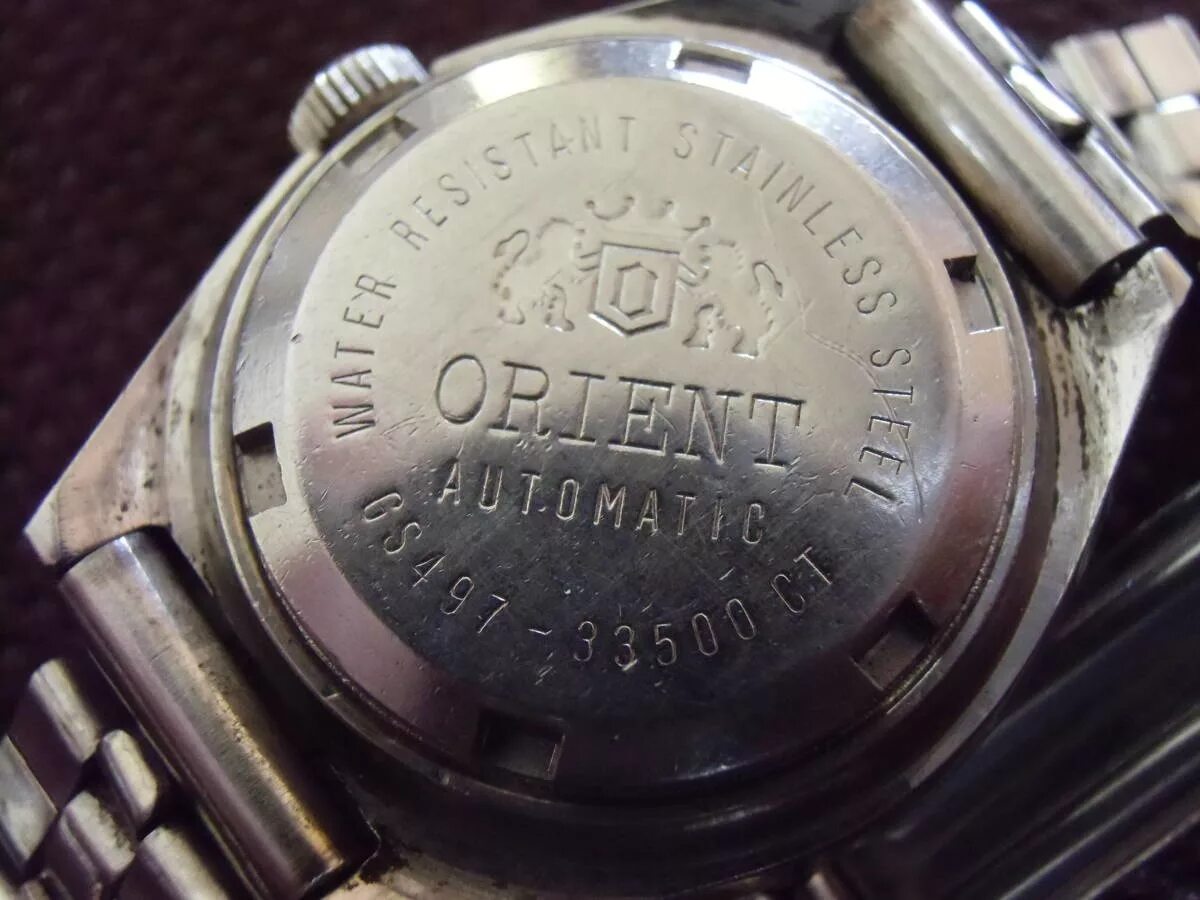 Проверь часовой. Серийный номер часов Orient Automatic. Серийный номер часов Ориент rn2003. Серийный номер часов Orient. Ориент Automatic серийный номер.