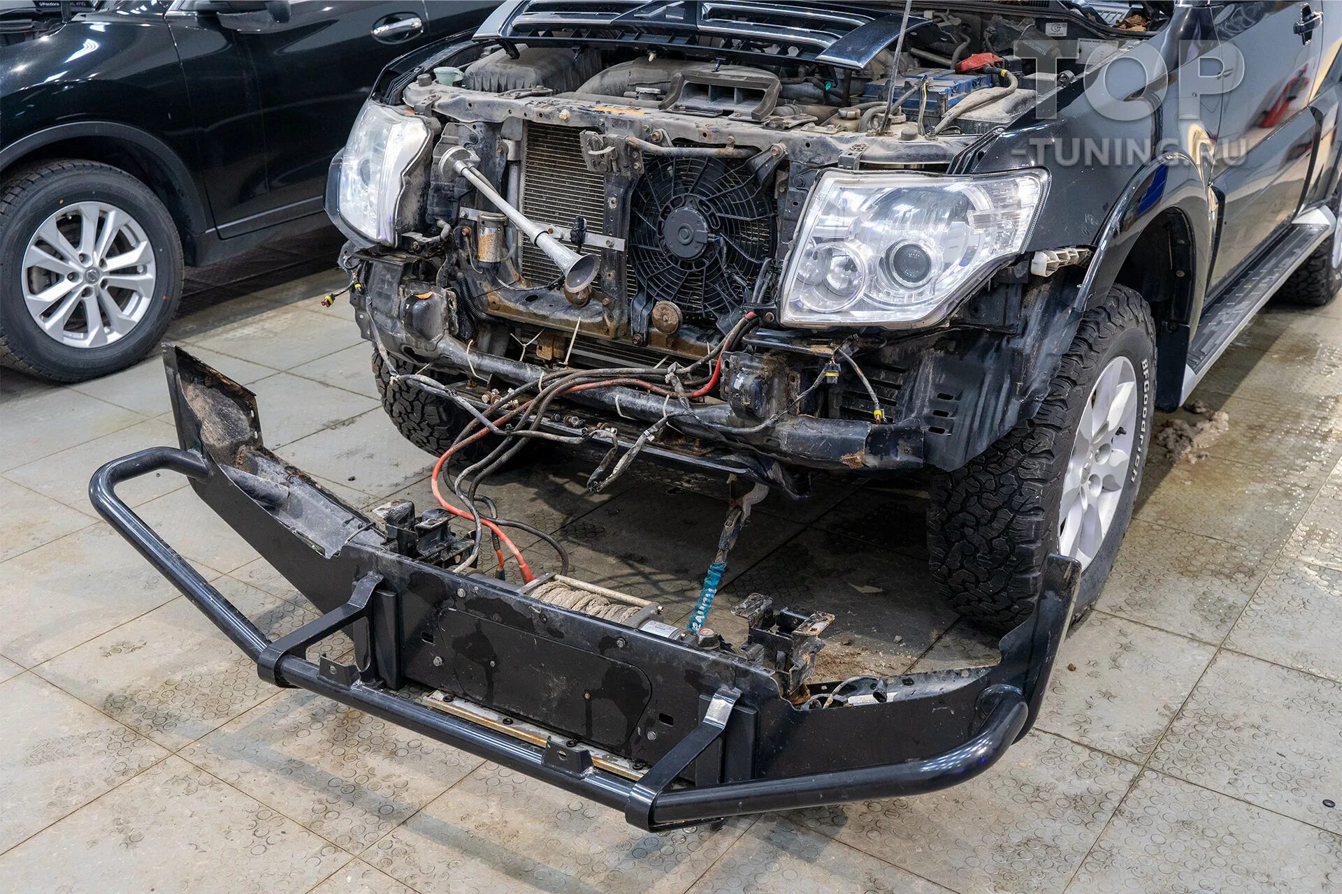 Замена линз в фарах Митсубиси Паджеро 4 (Mitsubishi Pajero IV) 2012 - Установка 