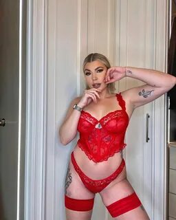 Olivia Bowen looks incredible as she poses in red lace lingerie for Valenti...