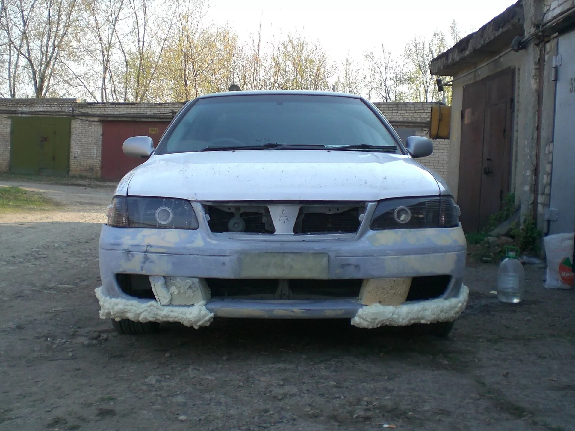 Губа передняя nissan liberty. Skyline v35 бампер. Скайлайн 35 кузов. Нисмо ниссан примера p12. Nissan sunny обвес.