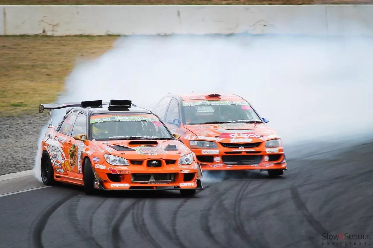 Эво карс симферополь. Mitsubishi Lancer Evolution Team Orange. Mitsubishi Lancer Evolution 9 дрифт. Mitsubishi Lancer Evolution 10 дрифт. Mitsubishi Lancer EVO Drift.