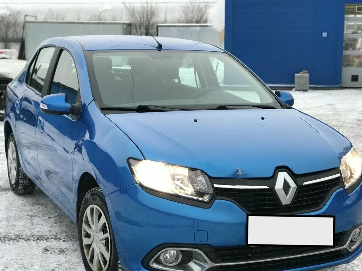 Куплю рено логан вологда. Renault Logan II 2014. Рено Логан 2014. Рено Логан 2 2014. Рено Логан 2014 года.