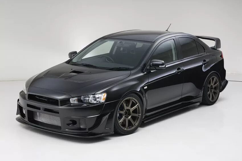 Митсубиси Лансер Эволюшн. Mitsubishi Lancer Evolution 10. Митсубиси Лансер 10 Эво черный. Mitsubishi Lancer EVO X Black. Обвесы mitsubishi