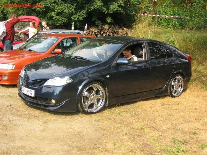 Nissan primera 2002 tuning. Nissan primera p12 тюнинг. Nissan primera р12 тюнинг. Тюнинг примеры. Nissan primera p12 обвес.