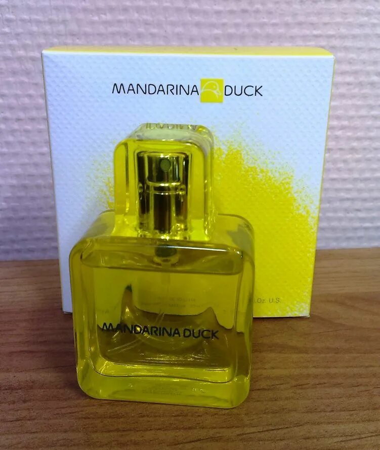 Mandarina Duck желтые духи. Mandarina Duck духи Freedomland. Духи Mandarina Duck 50мл. Духи мандарина дак женские 2010.