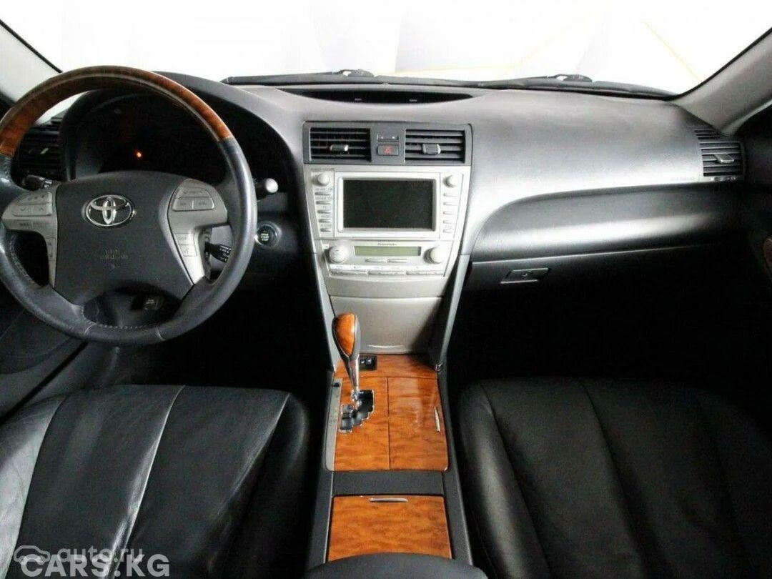 Торпедо камри. Тойота Камри 40 Рестайлинг салон. Toyota Camry xv40 Рестайлинг комплектации. Торпедо Camry 40. Торпедо Камри 40 Рестайлинг.