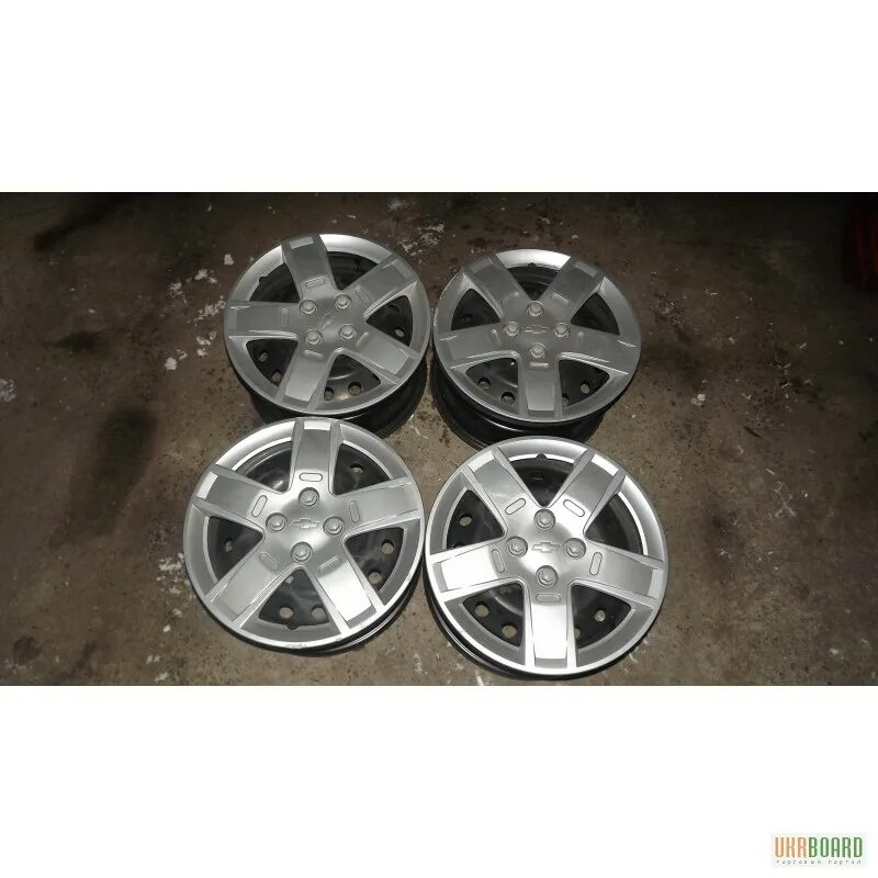 Диски литье aveo t250. Диски штампованные r15 авео т250. 14. Колпаки шевроле авео т250 r15. Chevrolet aveo 2009 диски r15.