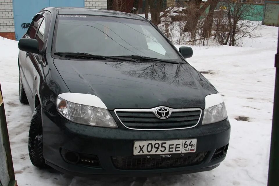 Купить короллу 120 новосибирск. Toyota Corolla 120 2005. Тойота Королла 120 2005. Тойота Королла 2005 год гос номер. Реснички на Тойота Королла е120 седан.