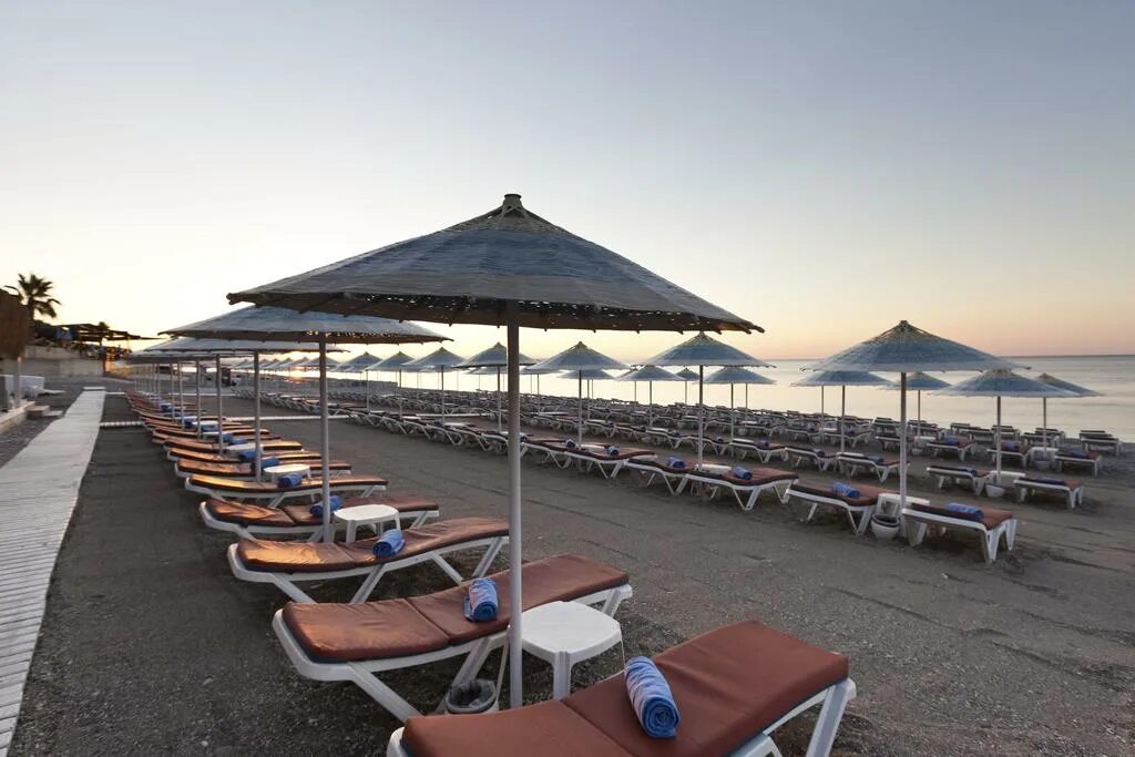 Porto bello hotel resort. Porto Bello Hotel Resort Spa 5. Porto Bello 5 Турция Анталия. Porto Bello Hotel Resort Spa 5* пляж. Пляж отеля Porto Bello Hotel Resort & Spa 5*.