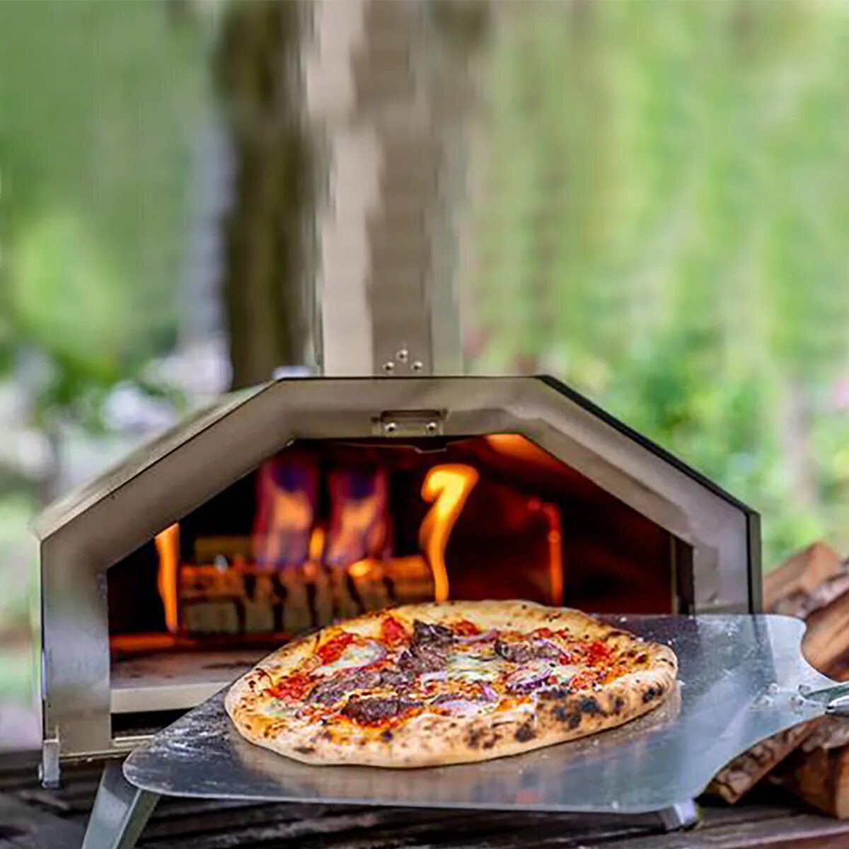 Печь под пиццу. Печь для пиццы Ooni. Печь для пиццы Ooni koda. Пицца на дровах. Пицца печь огонь.