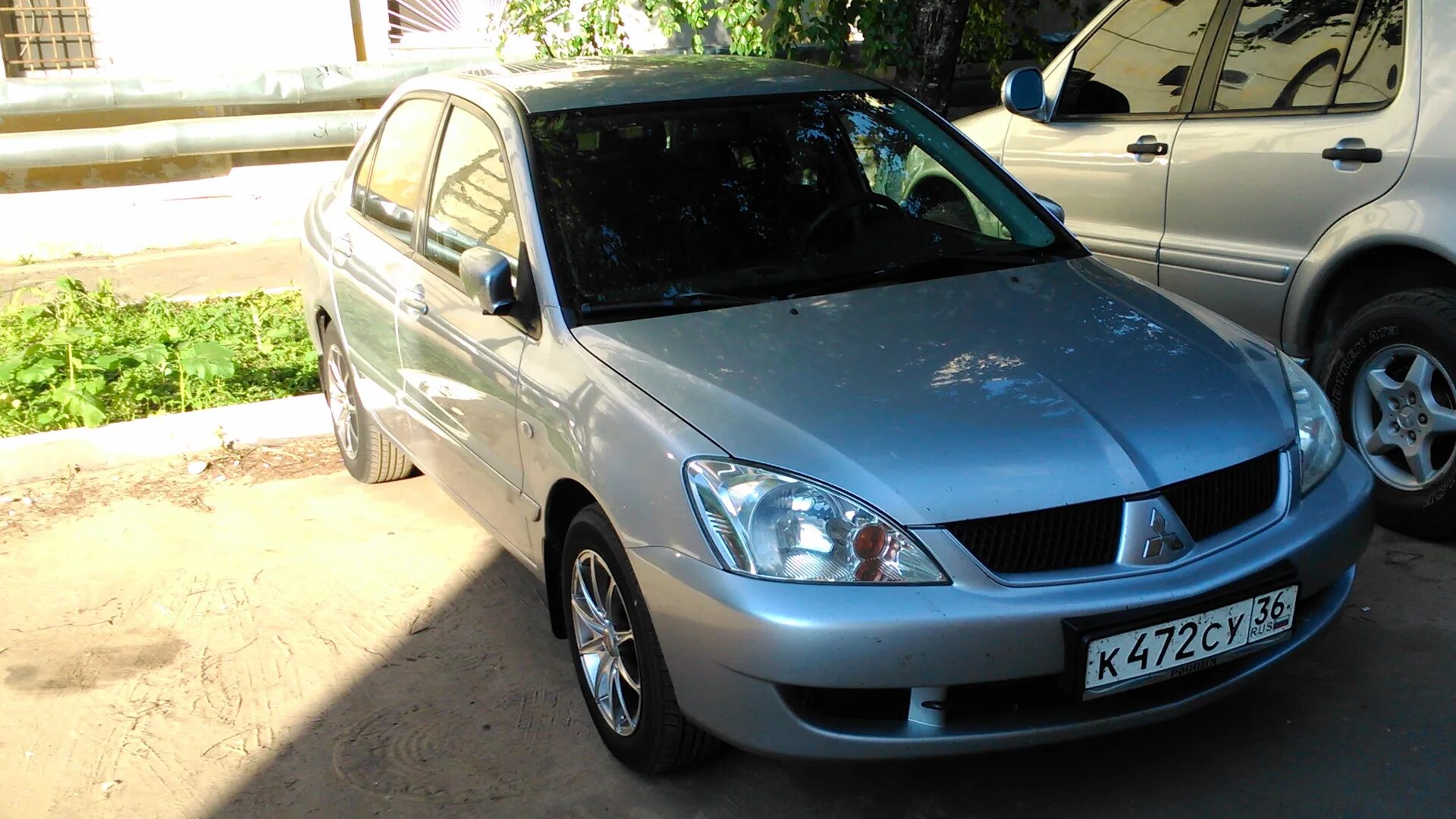 Mitsubishi lancer 2005 года. Mitsubishi Lancer 9 cs3a. Лансер машина 2005. Lancer cs3a. Лансер 2005 года.