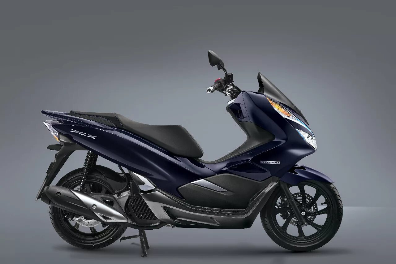 Макси скутер Honda PCX 150. Хонда PCX 125. Скутер Honda PCX 50. Honda PCX гибрид. Мощный мопед