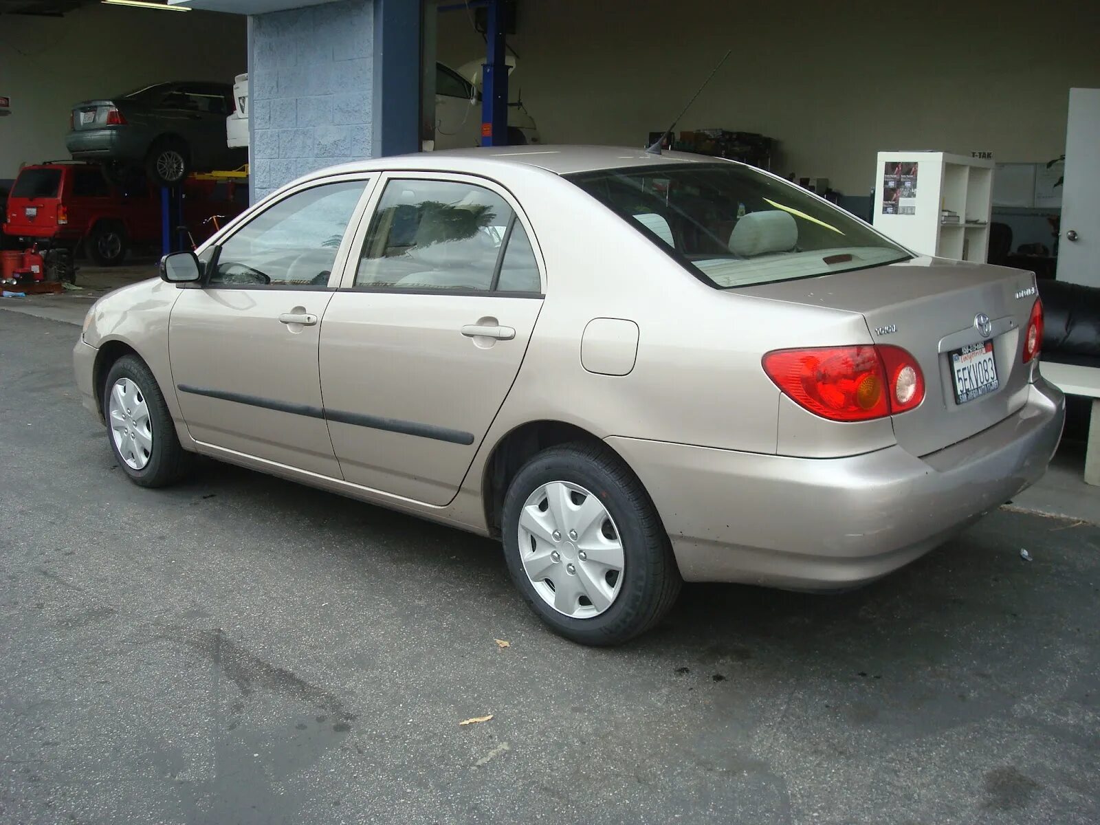 Toyota Corolla 2003. Тойота Королла 2003. Тойта Карола 2003. Тойота Corolla 2003.