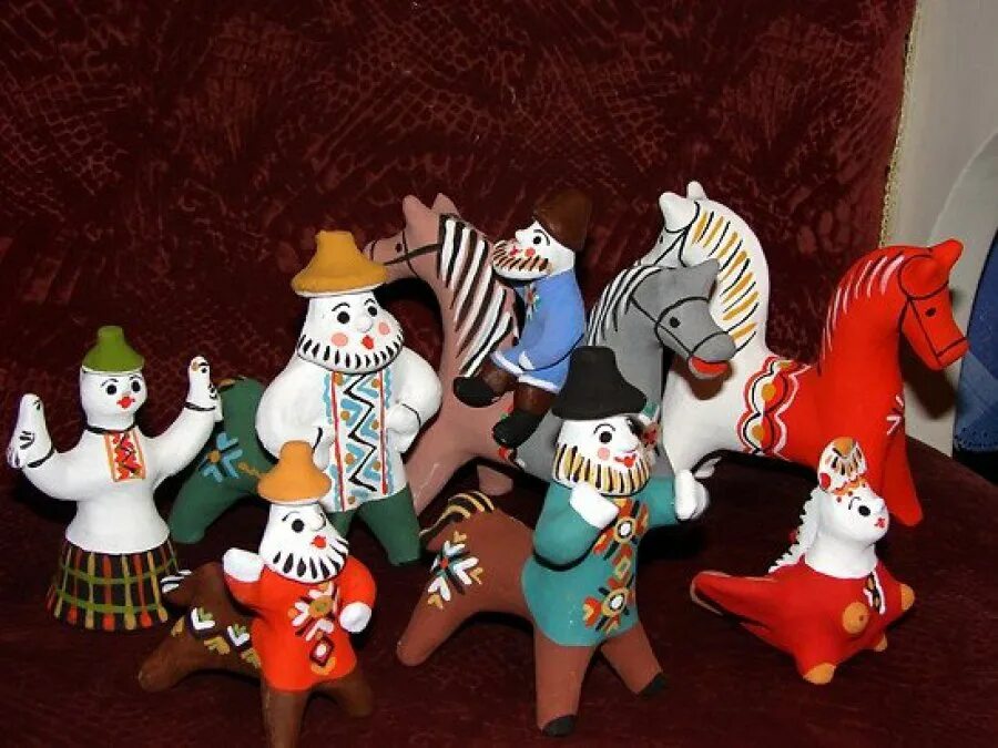 Народная глиняная игрушка каргопольская. Глиняная каргопольская игрушка глиняная. Каргопольская игрушка мужичок. Каргопольский народный промысел. Каргопольская глиняная игрушка.