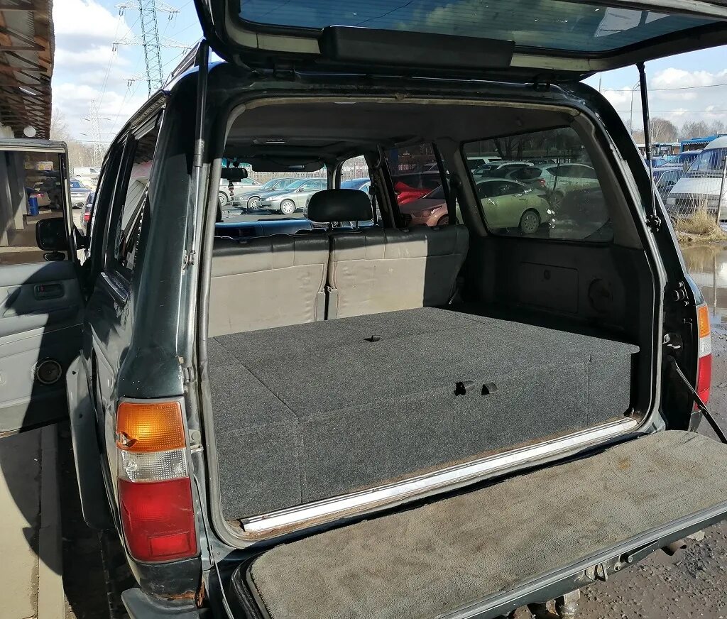 Land cruiser 80 active vacation. Спальник тойота ленд крузер 80. Ленд крузер 80 салон багажник. Land cruiser 80 третий ряд сидений. Toyota land cruiser 80 салон багажник.