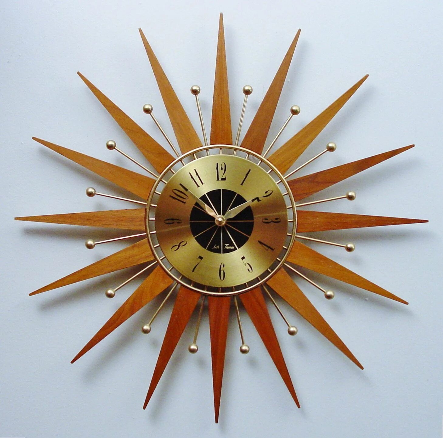 Часы настенные мид сенчури. Mid century clock1950s. Часы мид. Часы в стиле мид сенчури. Наручные часы mido m025.