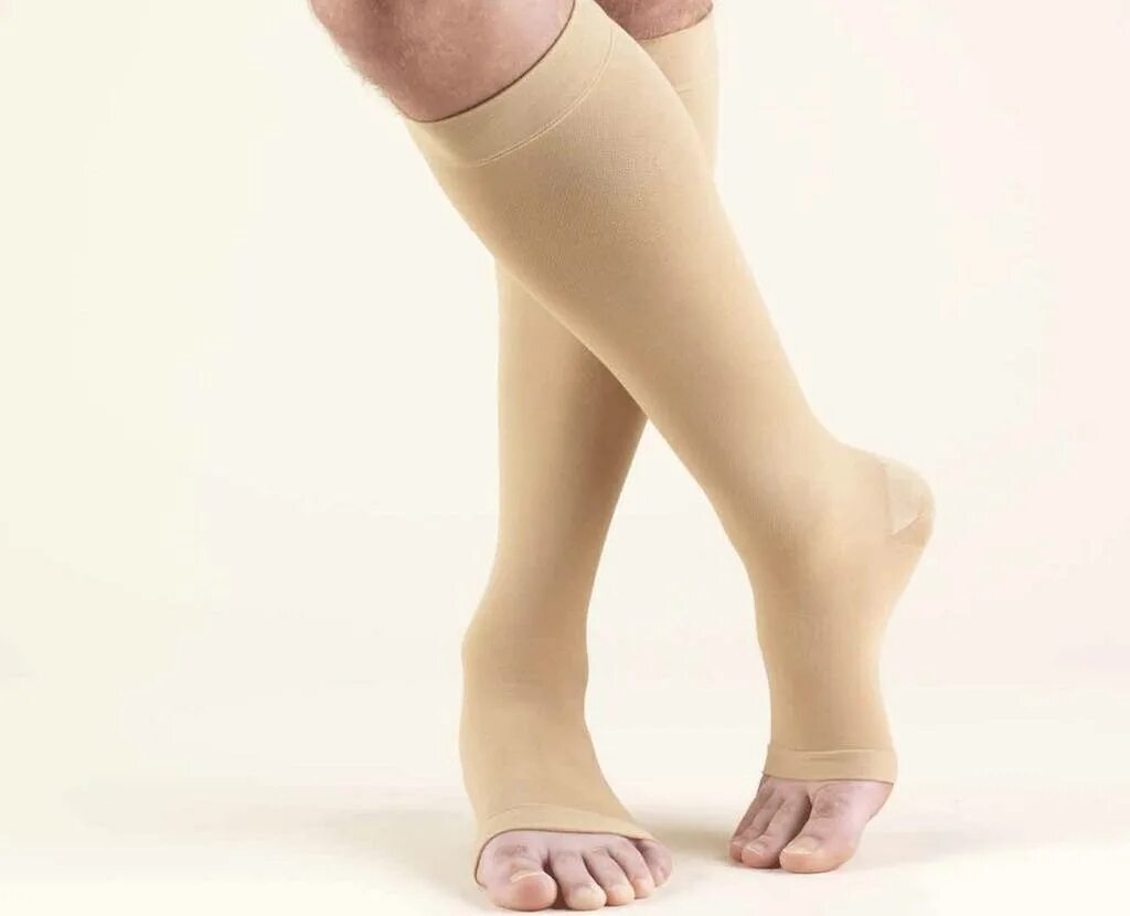 Для чего нужны чулки после операции. Гольфы компрессионные Jobst Classic Medical Compression stockings. Чулки компрессионные Jobst Classic Medical Compression stockings. Компрессионные гольфы для мужчин Экотен 215. Эластическая компрессия нижних конечностей 2 класс компрессии.