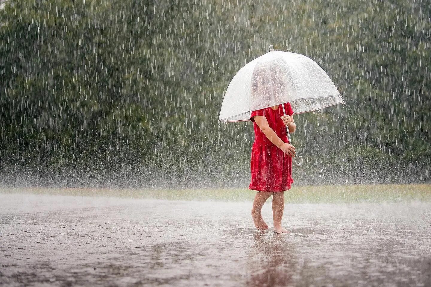 Playing in the Rain. To pour Rain. Start Rain. Girls playing in Rain. She s in the rain