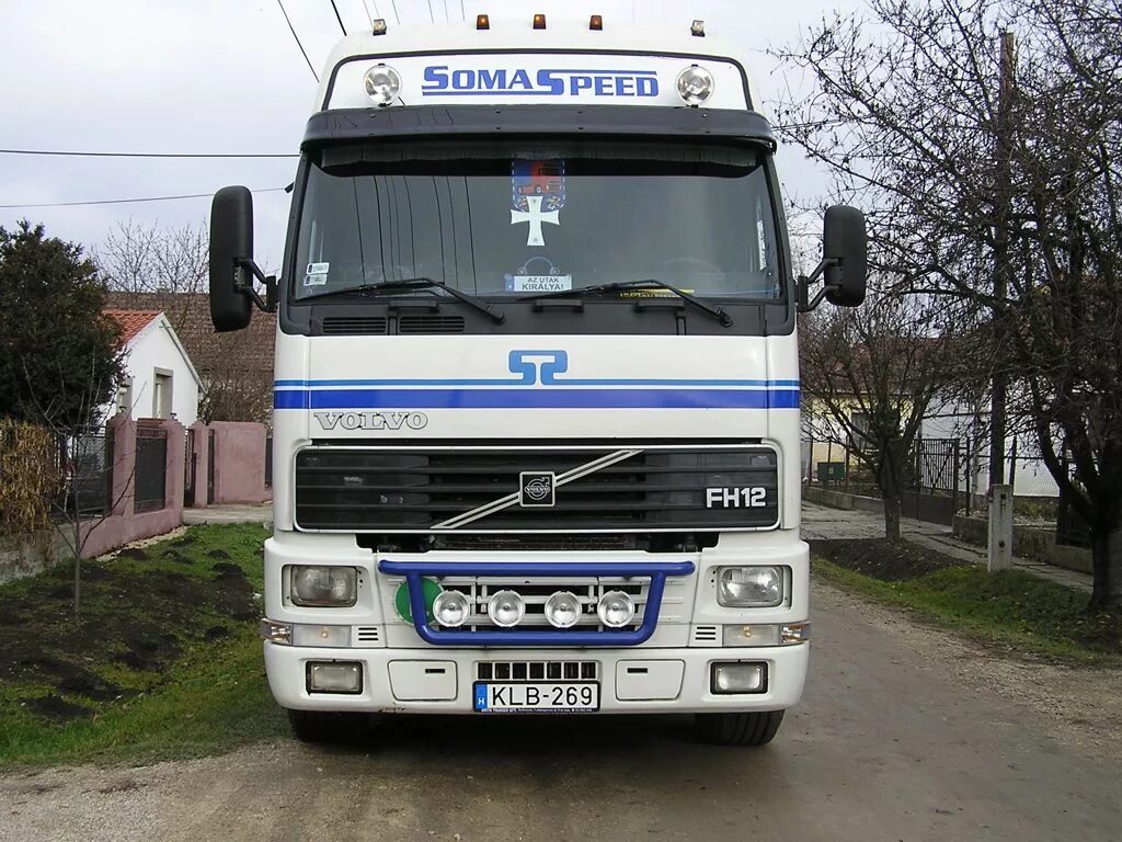 Volvo fh 12 2000 года. Вольво ФШ 12. Volvo fh12 2002. Вольво fh12. Volvo fh12 2004.