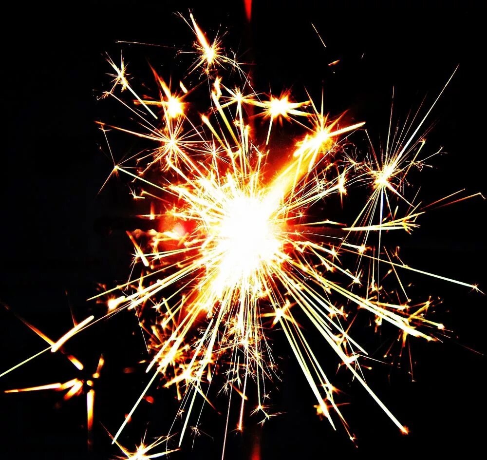 Искры костра. Искры нн. Бенгальские огни на белом фоне. Искры нн. Искры от удара.