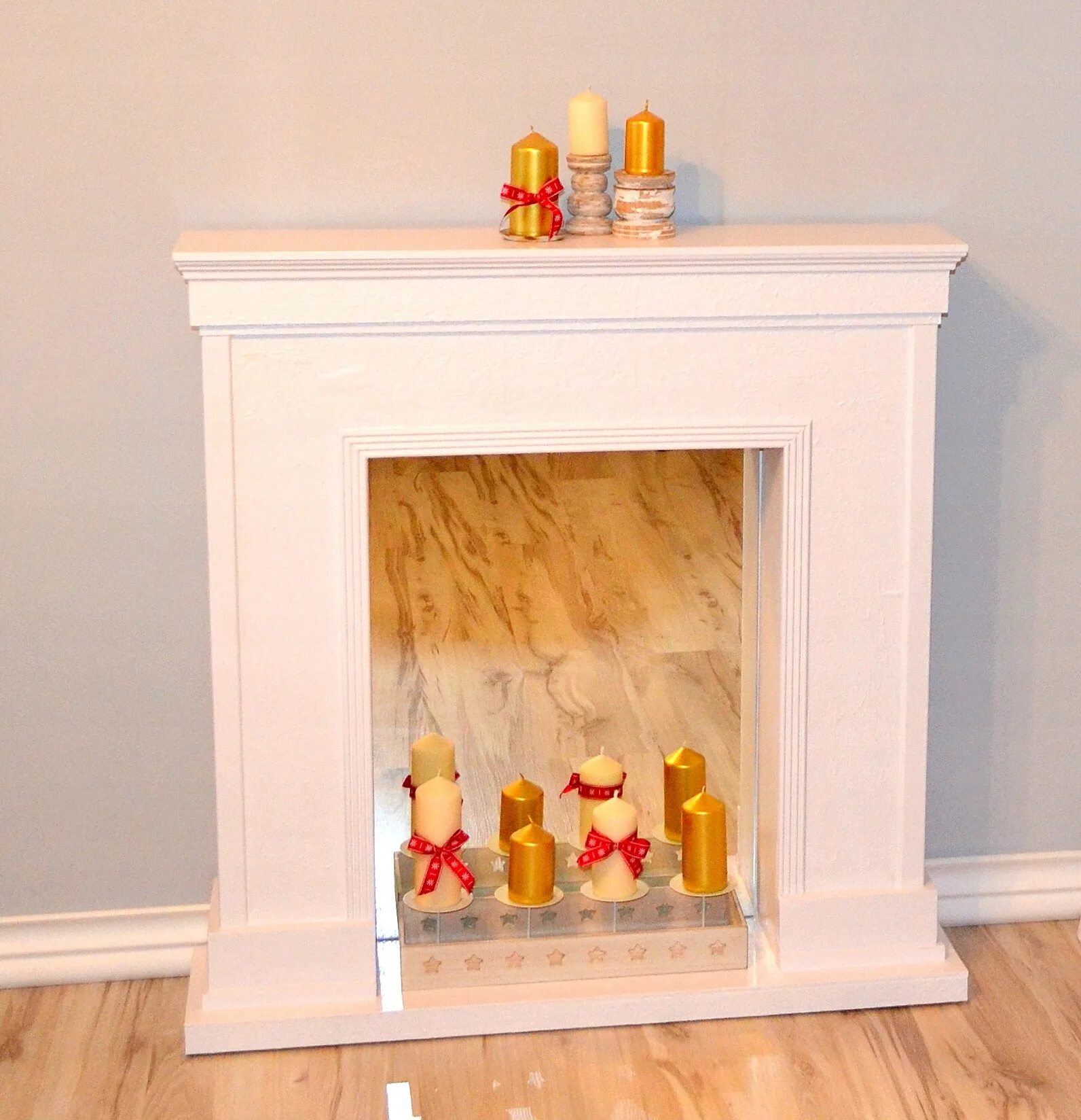 Подсветка для декоративного камина. Камин из гипсокартона. Декоративный камин имитация. Декоративный камин. Декоративный фальш камин.