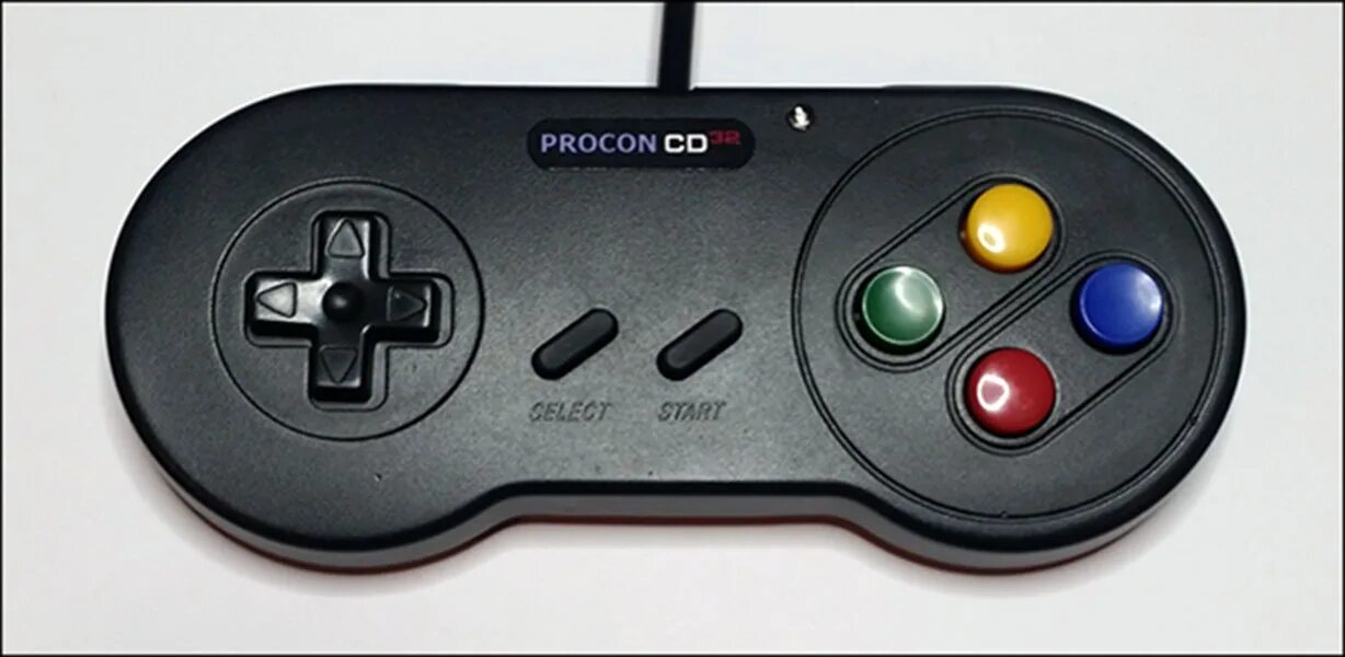 Проверить джойстик на пк. Amiga cd32. Commodore amiga cd32 игры. Jaguar 64 Gamepad. Commodore 64 Gamepad.