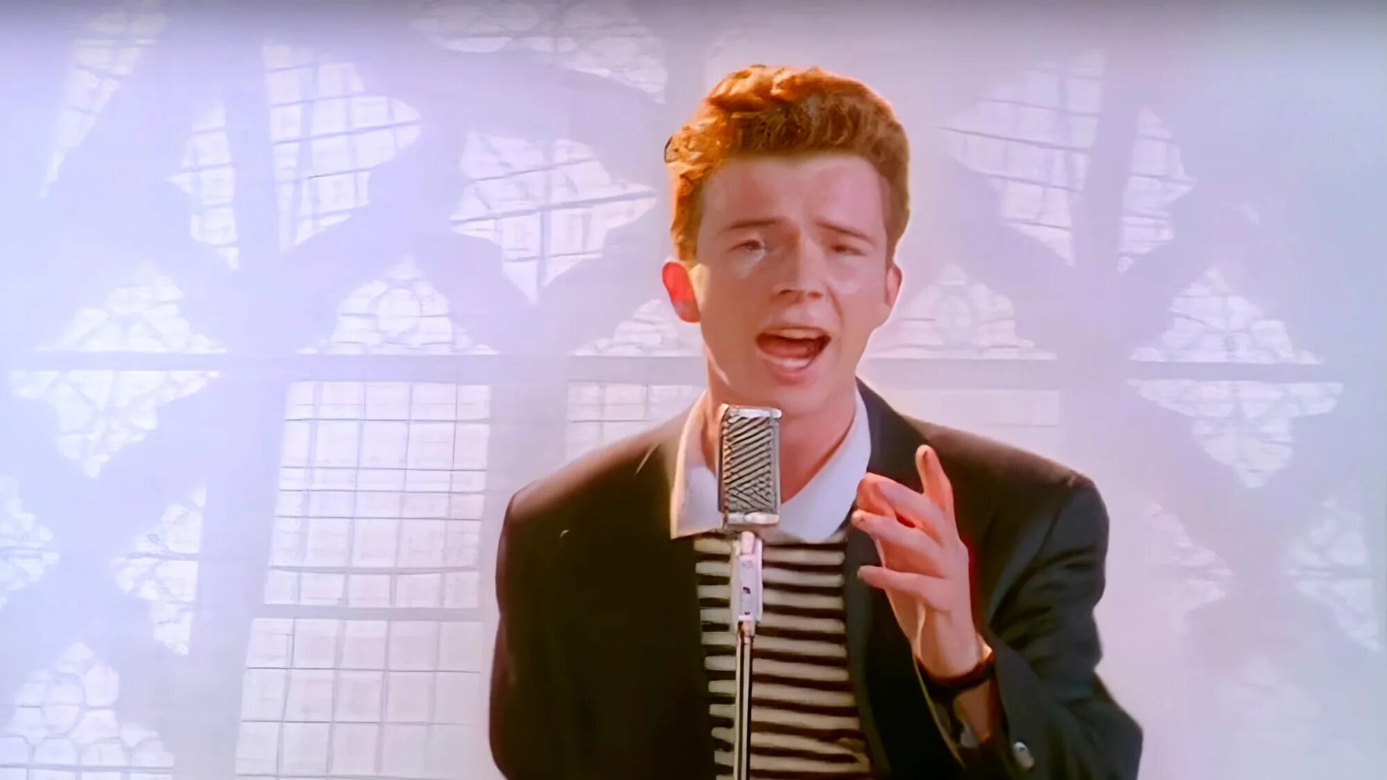 Что такое рикрол. Рик Эстли. Рик Эстли never gonna. Rick Astley never gonna give you. Рик Эстли never gonna 2022.