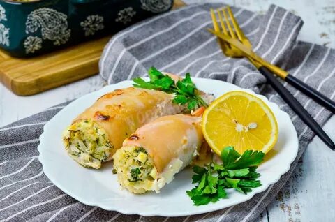 Кальмары фаршированные грибами и сыром в духовке