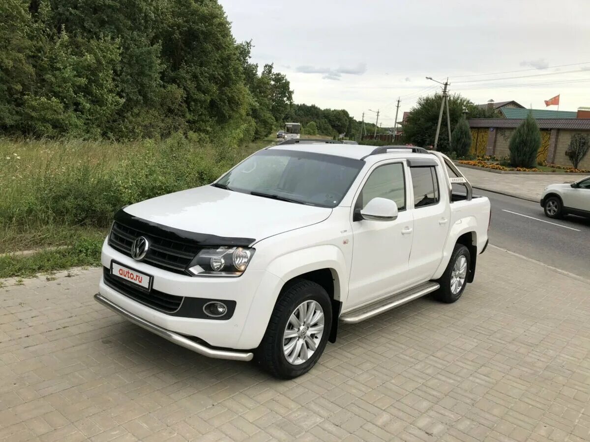 Купить амарок дизель. Фольксваген Амарок 2014. Volkswagen Amarok белый. Amarok Volkswagen 2014 года. Фольксваген Амарок пикап белый.