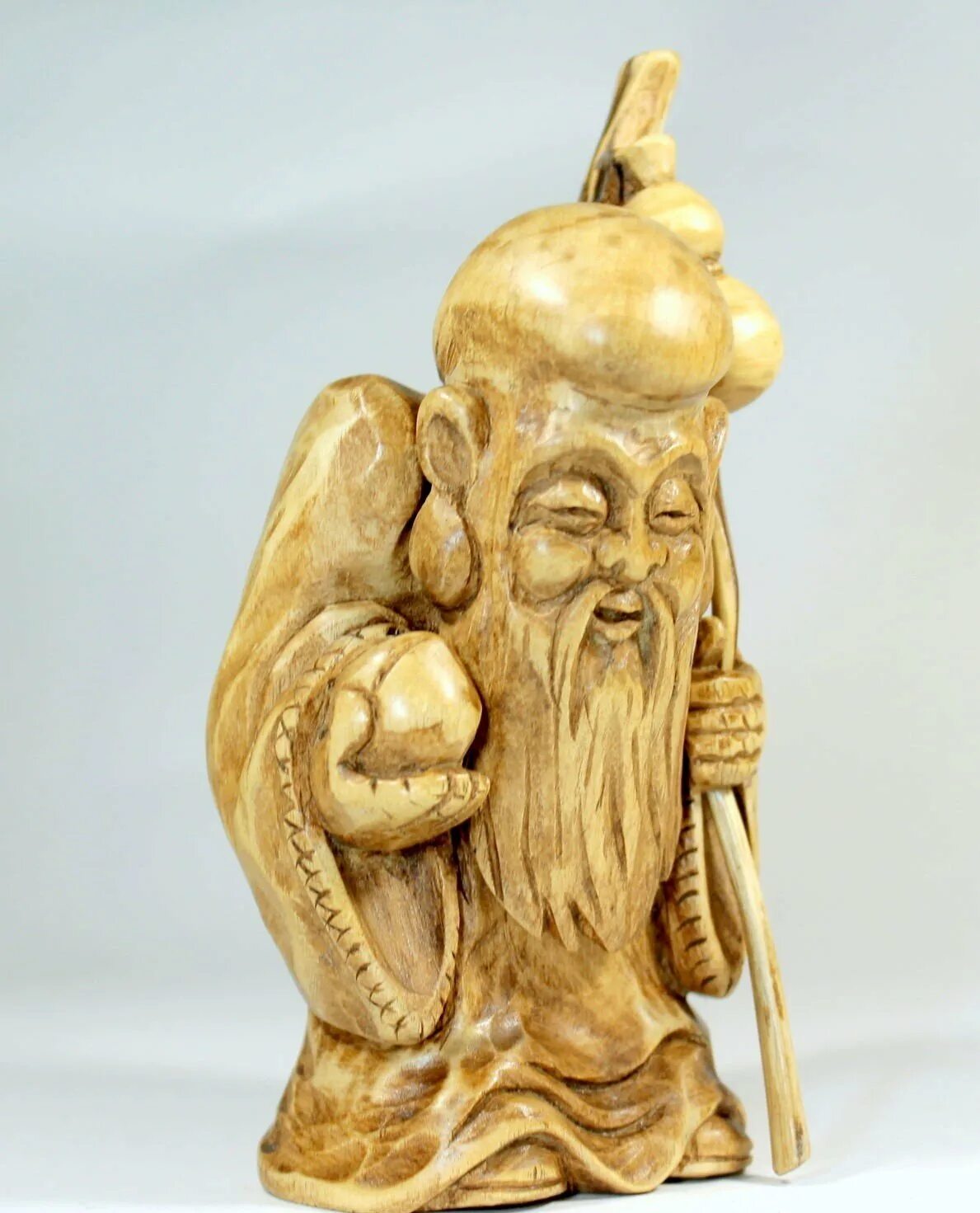 Шоусин божество долголетия. Статуэтка Шоусин Бог долголетия. Скульптура Бог долголетия Шоусин. Китайский Бог долголетия шоу син.
