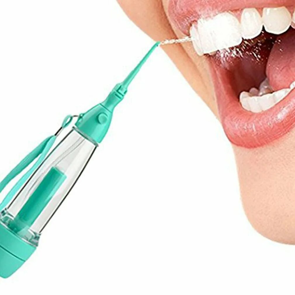 Чистить зубы аппаратом. Ирригатор Tooth Cleaner.