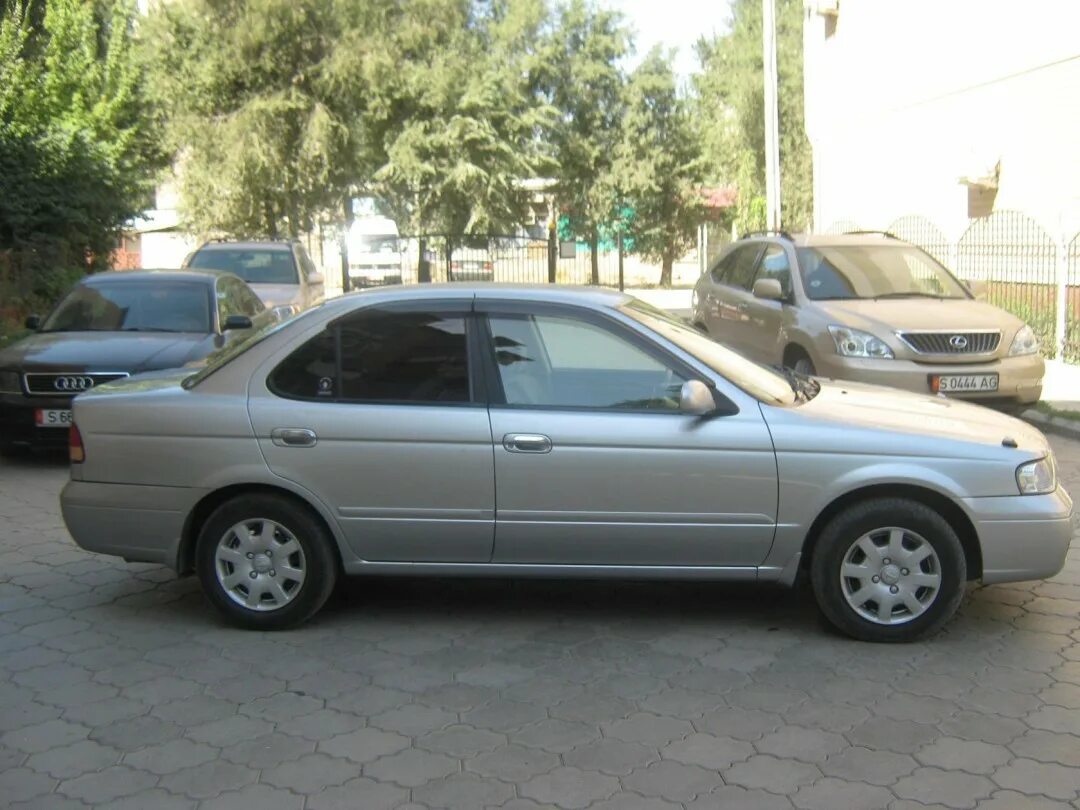 Ниссан санни 2004. Nissan Sunny 2004. Nissan Sunny 2004 года. Ниссан Санни 2004 года.