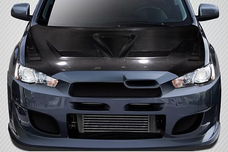 Купить капот митсубиси лансер. Mitsubishi Lancer Carbon. Эво капот на Лансер 10. Карбон Lancer EVO 10. Митсубиси Лансер в карбоне.