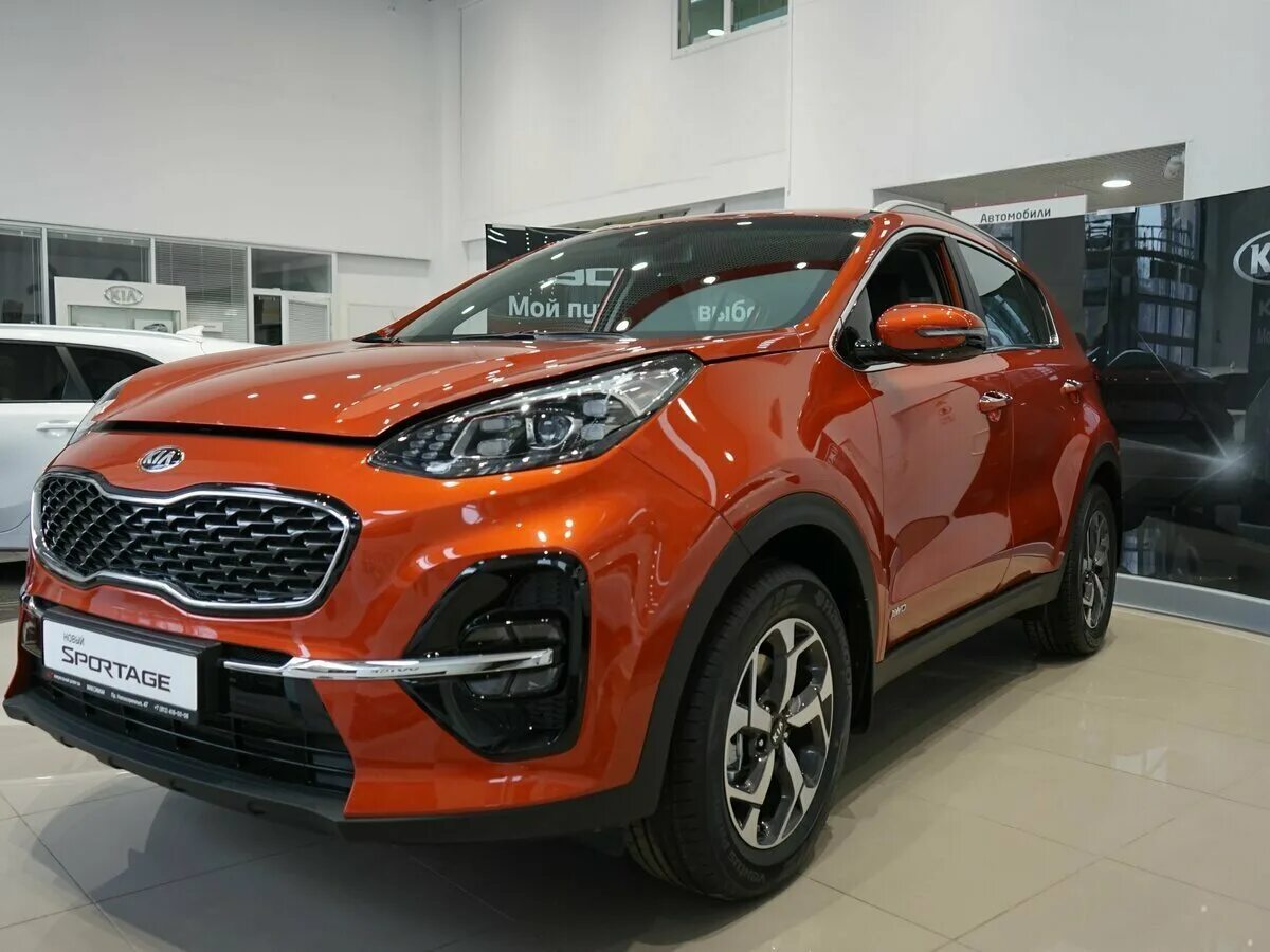 Kia Sportage 2021 Orange. Kia Sportage 2019 оранжевый. Kia Sportage 2021. Kia Sportage 2019 комплектации.