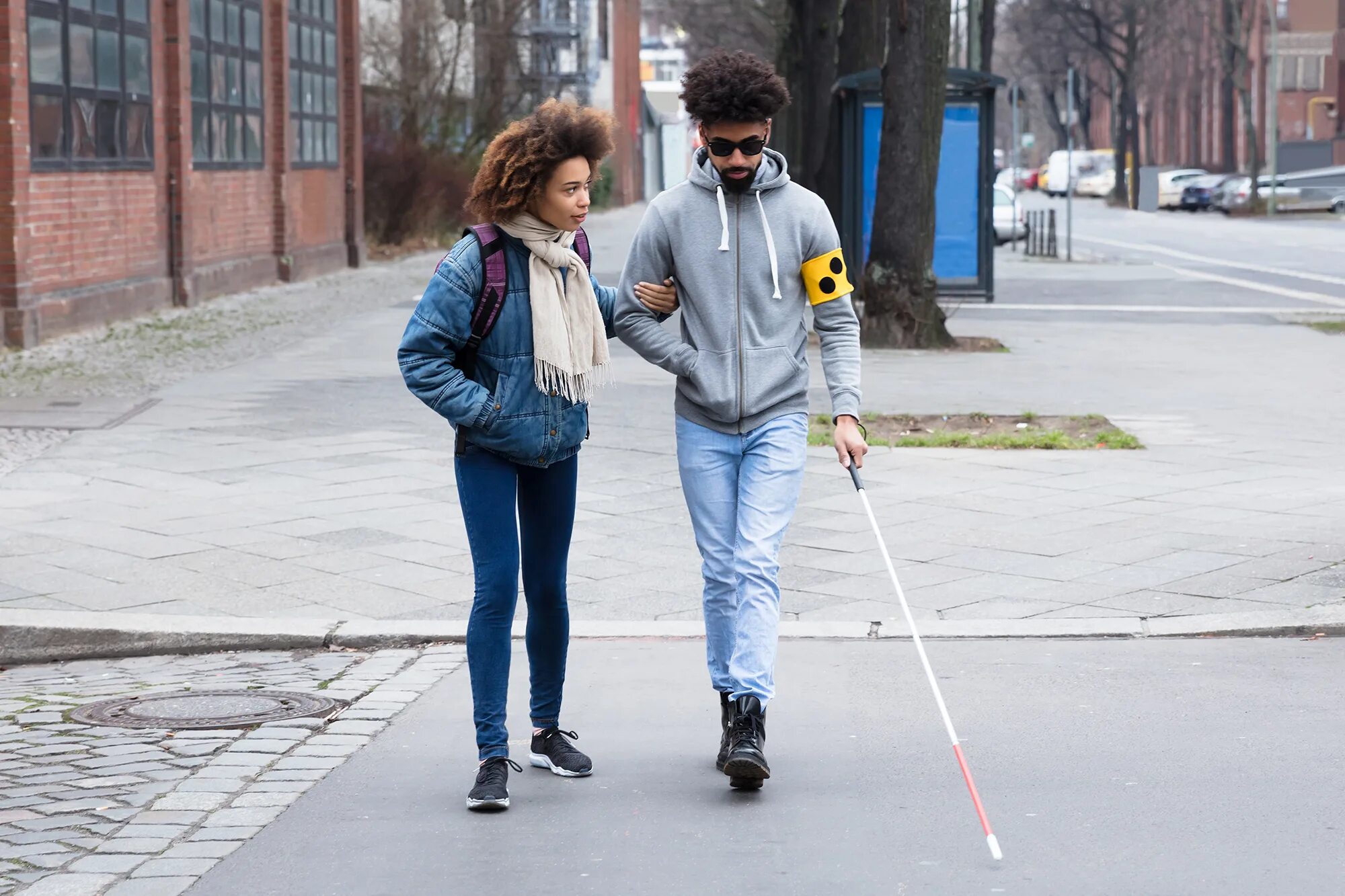 Blind man saving lady jogger