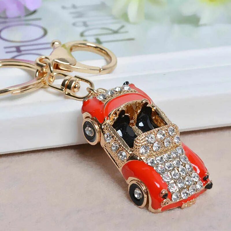 Автомобильный брелок. Брелок «автомобиль». Брелок в виде автомобиля. Брелок металлический. Брелок машинка.